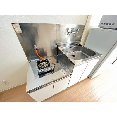 ユニオンマンスリー矢野口５　307　1R・セミダブル☆人気の角部屋＆2面採光♪デスク・チェア＆洗濯機など生活家電のあるお部屋の物件写真3