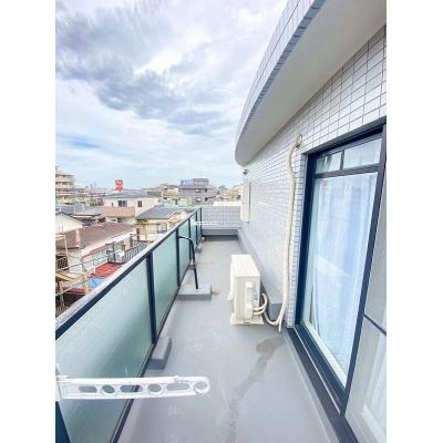 ユニオンマンスリー妙典１　402　1K・シングル☆【禁煙ルーム】人気の角部屋♪AL＆モニター付きインターフォン＆室内洗濯機完備♪ソファ・ローテーブルのあるお部屋の物件写真6