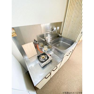 ユニオンマンスリー京王稲田堤３　206　1R・シングル☆【禁煙ルーム】ローテーブル・ソファのあるお部屋♪洗濯機や掃除機など生活家電完備の物件写真2