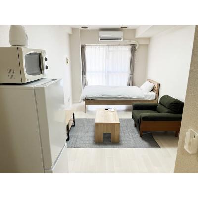 ユニオンマンスリー新松戸１　205　1K・シングル☆【禁煙ルーム】くつろげる一人掛けソファつき♪2ドア冷蔵庫や電子レンジなど生活家電のあるお部屋！安心の建物オートロック完備の物件写真1