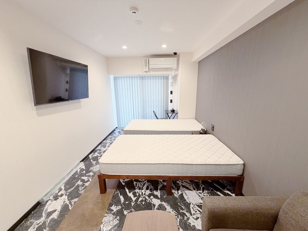 マンスリーリブマックス那覇松山ウッドサイド『WI-FI完備・50型TV・禁煙部屋・ツインベッド・ドラム式洗濯機・洗浄機能付便座』の外観画像